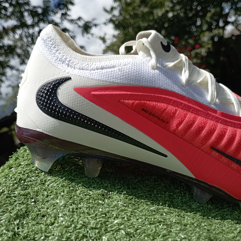 Phantom 6 Low Elite — rojo blanco (FG, césped natural)