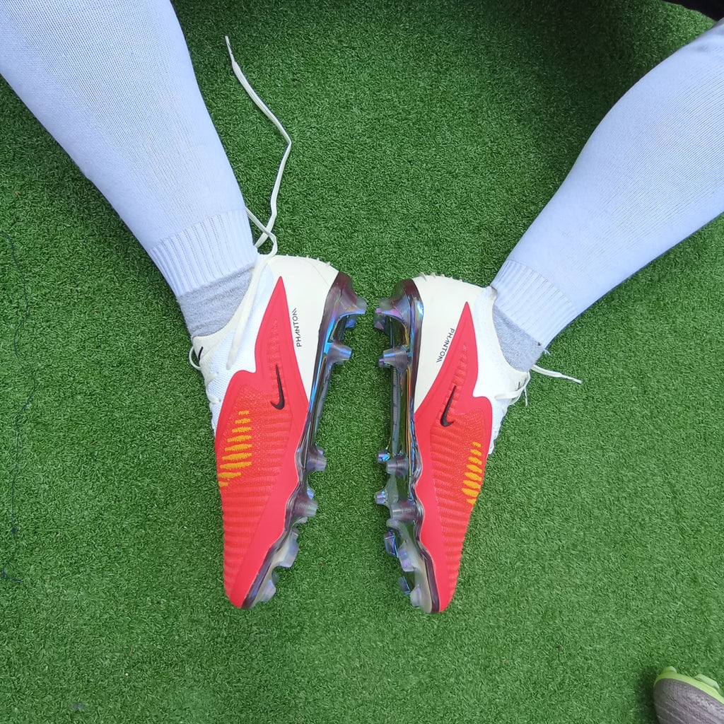 Phantom 6 Low Elite — rojo blanco (FG, césped natural)